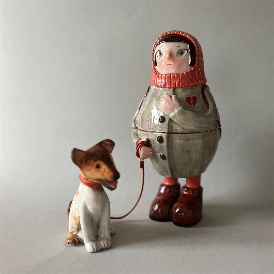 Refugee matryoshka with a dog